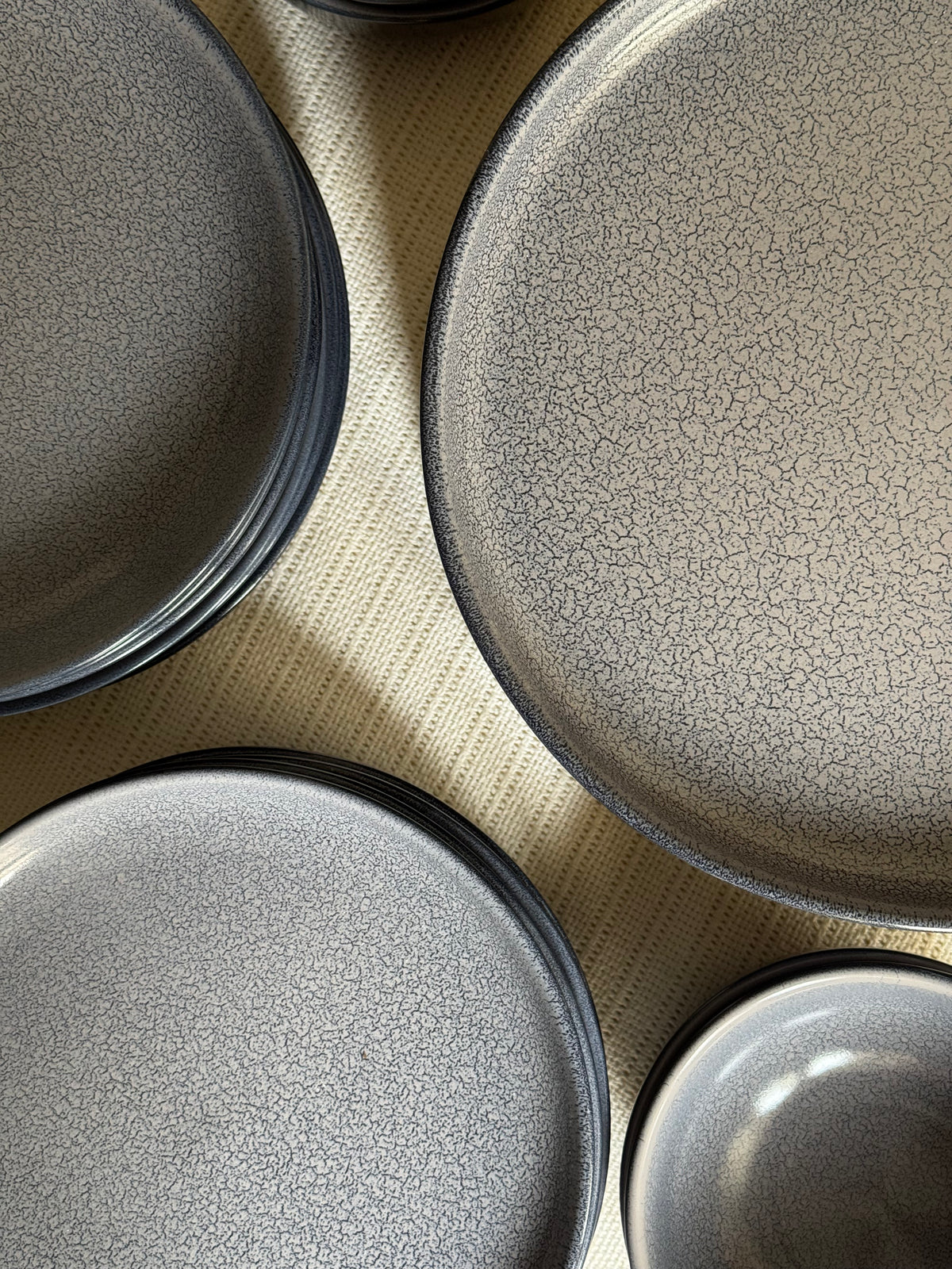 Noir Terra Dinner Set — reactive glaze finish in deep grey & blue with a dry lake crackle pattern | Shape N Style Home